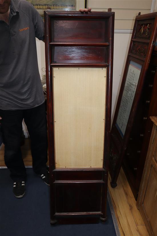 A pair of 19th century Chinese carved wood and glazed panels W.41cm